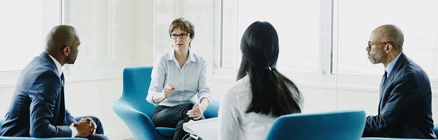 A boardroom meeting of trust company bankers