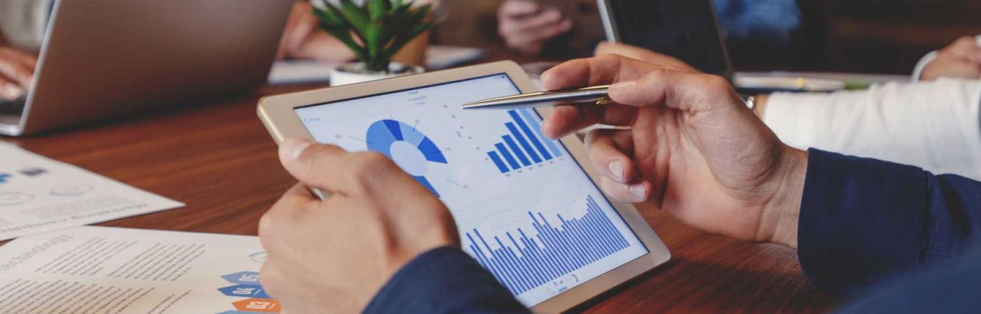 A trust company banker meeting with clients