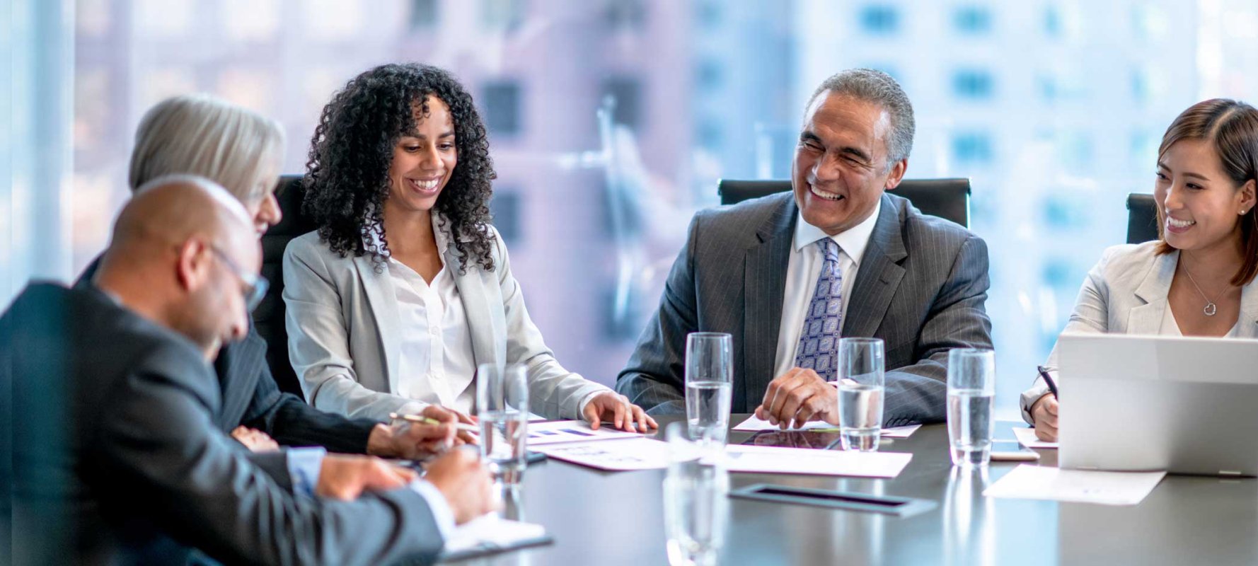 Trust company executives meeting with clients