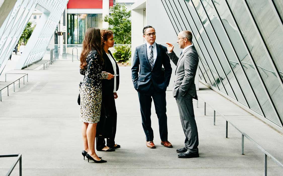 Trust company experts meeting with business owners